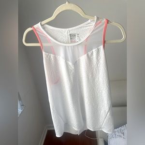 White sleeveless tee with unique texture